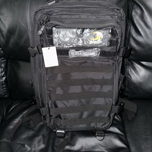 Tactical backpack 40L comes in black and washed green. 1 of each color available